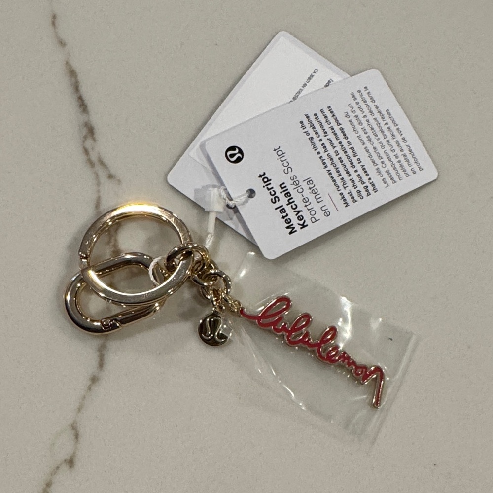 Lululemon Metal Script Keychain NWT Red/Gold - Picture 2 of 3